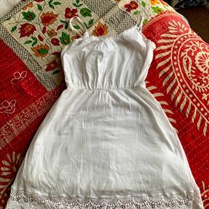 White sleeveless shirt dress